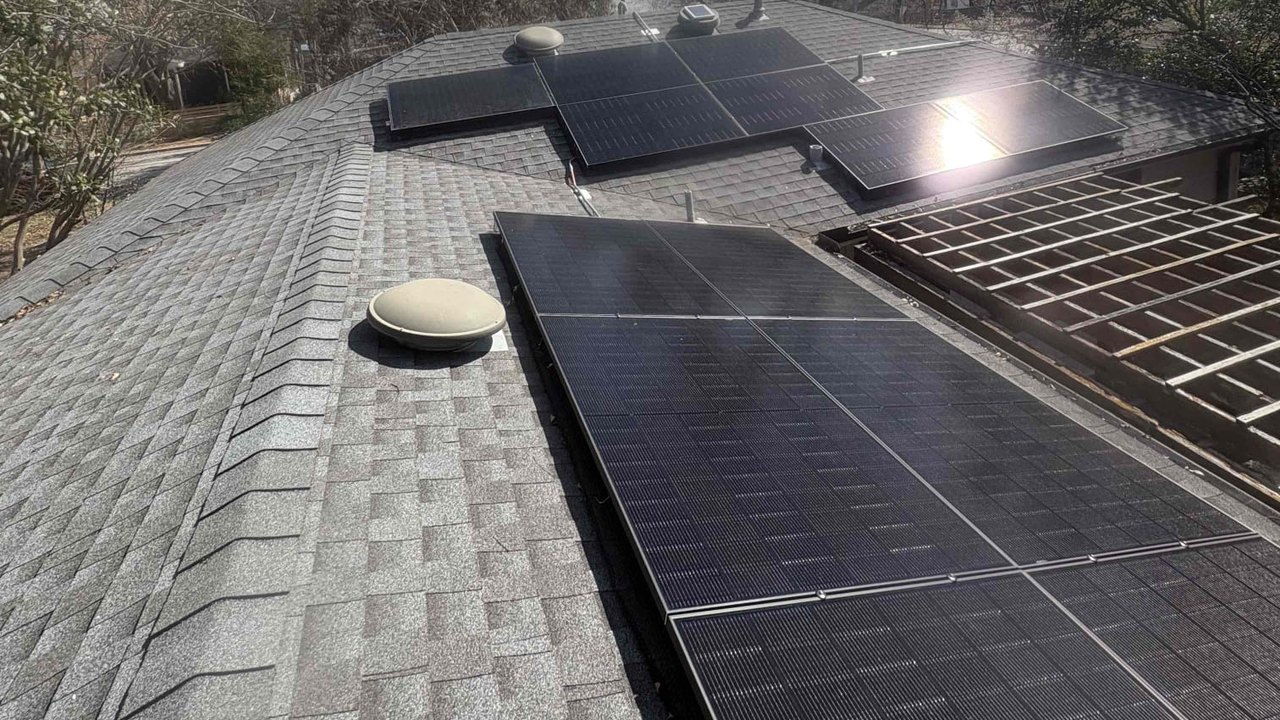 New all-black solar panels installed across the roof after the upgrade