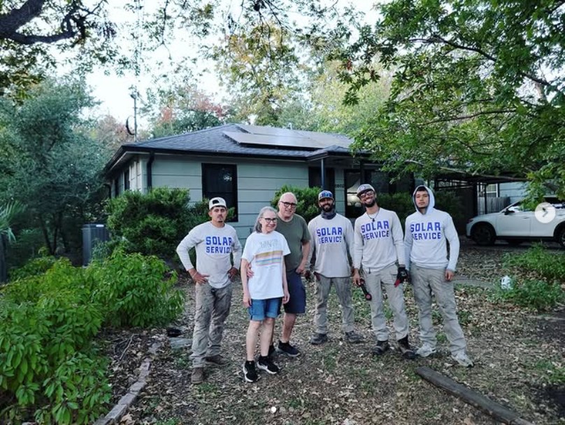 The Ramos family with the Solar Service crew outside their Austin home