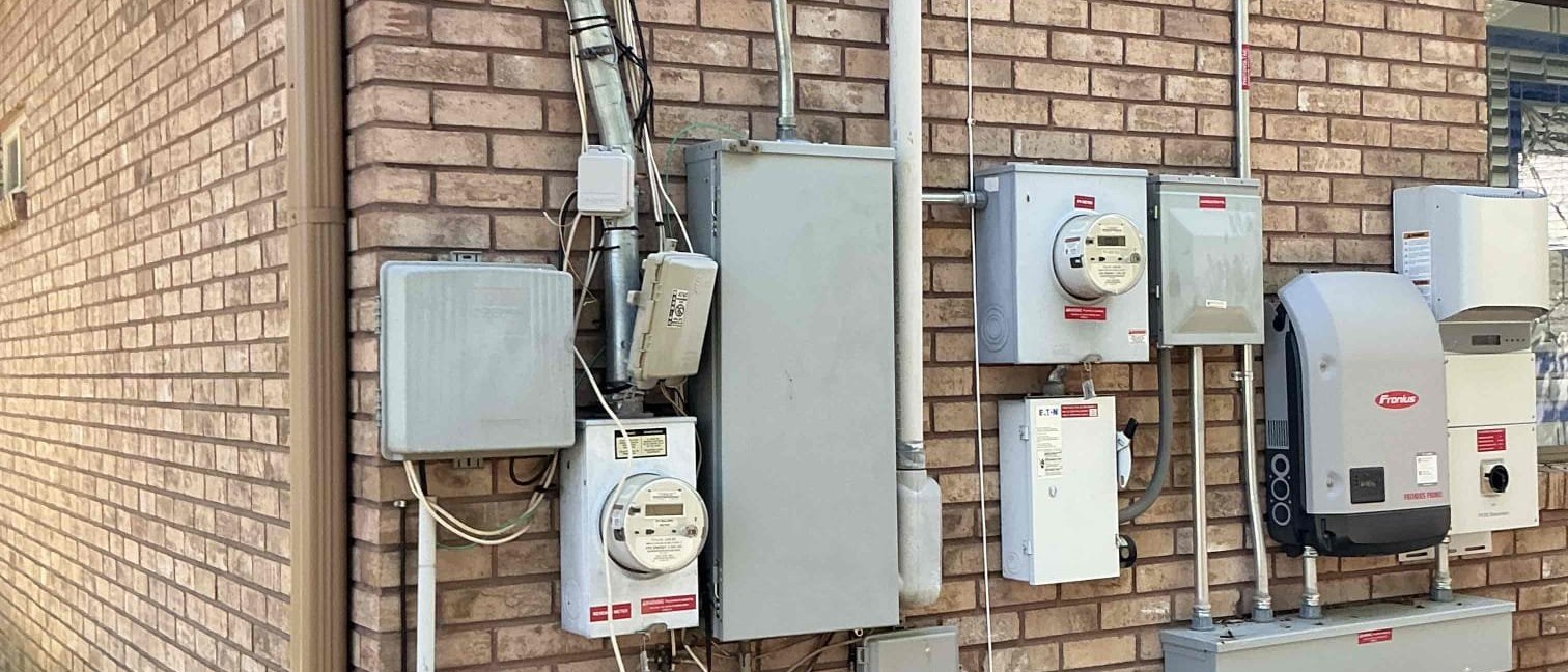 Exterior solar electrical equipment serviced by Solar Service in Central Texas