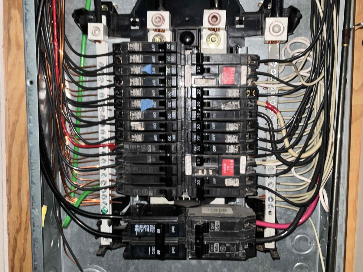 Residential electrical panel with the dedicated breaker added for an EV charger circuit