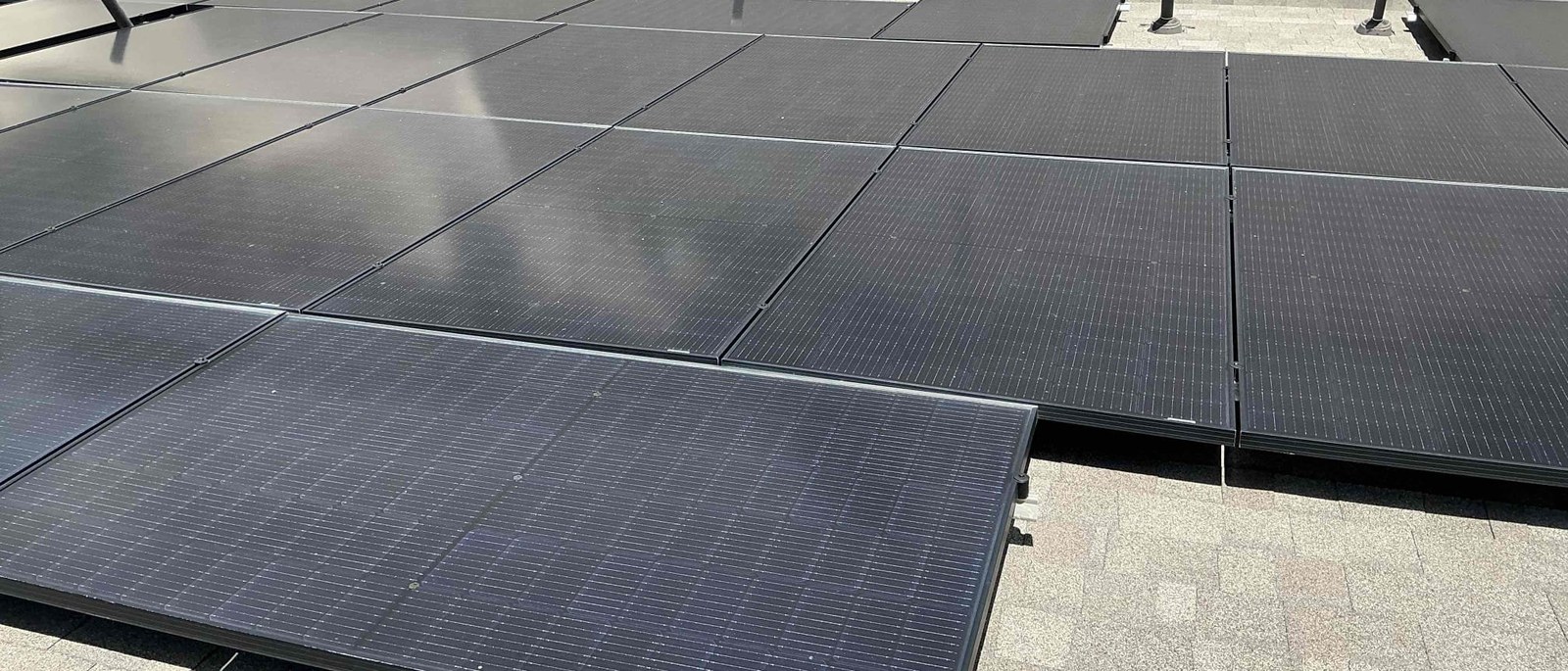 Rooftop solar array documented during a home sale inspection in Central Texas