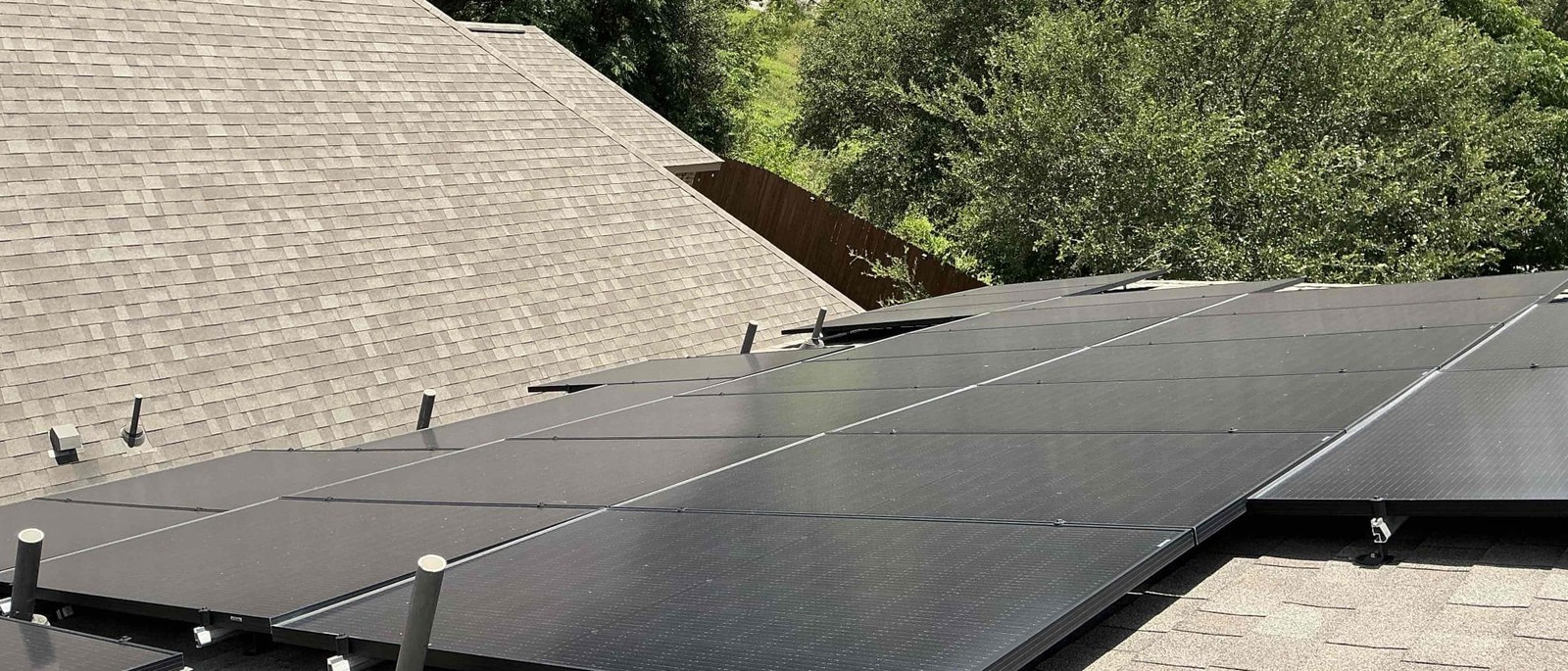 Rooftop solar array being inspected by Solar Service in Central Texas