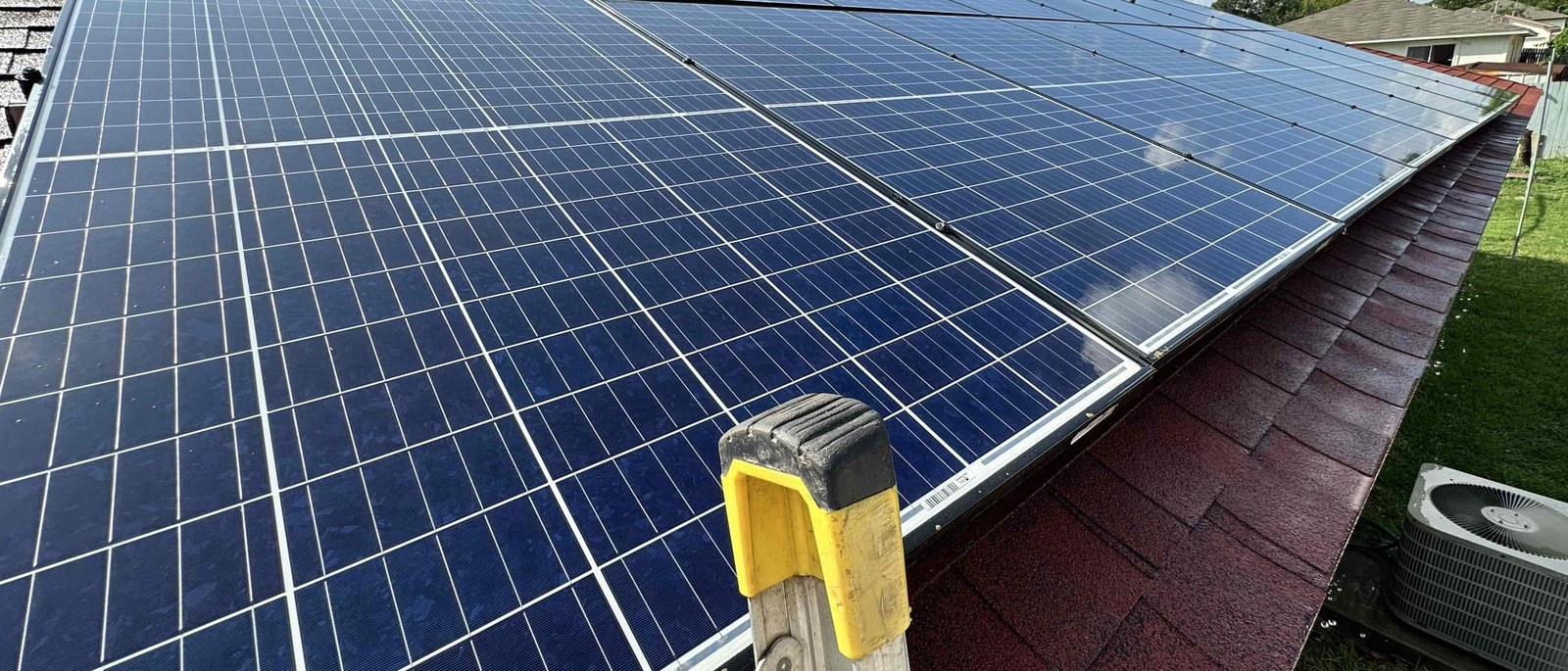 Rooftop solar panel array on a Central Texas home serviced by Solar Service