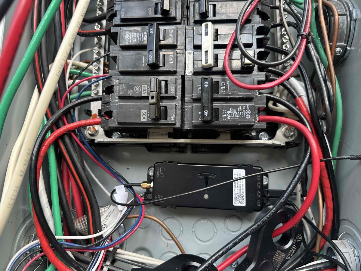 Electrical sub-panel rewired during a solar system upgrade in Central Texas